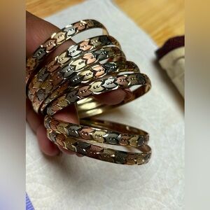 set of (6) gold plated bracelets (oro laminado)